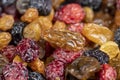 dried cranberries with yellow and black raisins mixed together