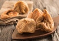 Dried cut figs on a dark wooden spoon. Royalty Free Stock Photo