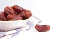 Dried dates fruit on white background