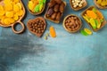 Dried dates, fruits and nuts on rustic background. tu bishvat holiday concept. Top view, flat lay