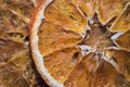 Dried delicious oranges for cold seasons on a table, close up, macro photography