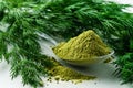 dried dill weed with fresh dill weed on white, dry powder dill super food Royalty Free Stock Photo