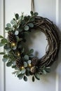 Dried eucalyptus wreath with small pinecone tree ornament and tea light, rustic, holiday Royalty Free Stock Photo