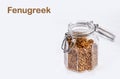 Dried fenugreek seeds in the jar - Trigonella foenum-graecum Royalty Free Stock Photo