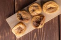 Dried fig fruit on brown wood Royalty Free Stock Photo