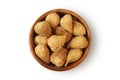 Dried figs in wooden bowl on white background Royalty Free Stock Photo