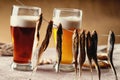 Dried fish and beer on the table Royalty Free Stock Photo