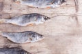 Dried fish on the old wood table background Royalty Free Stock Photo