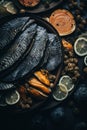 dried fish on a plate with lemon slices and other ingredients