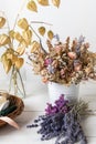 Dried flowers arrangement. Sustainable floristry. Home decor with dried flowers.