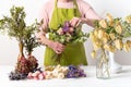 Dried flowers. Female florist arranging dried flowers into a beautiful bouquet. Sustainable floristry.