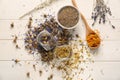 Dried flowers and herbs on white wooden table Royalty Free Stock Photo