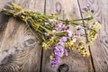 Dried flowers Limonium on wooden background