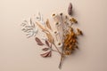 Dried flowers minimalist bouquet flat lay on light background. AI generated image