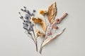 Dried flowers minimalist bouquet flat lay on light background. AI generated image