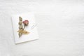 Dried flowers of roses on a white paper. pink. yellow