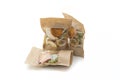 Dried fruit chips in paper packaging. Natural organic dessert apple banana persimmon kiwi orange mandarine pear cut into slices.