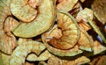 Dried fruit in glass and metallic dishes