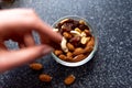 Dried fruit and nuts on a hand