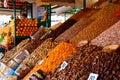 Dried fruit and nuts on market stall at the bazaar in Marrakesh, Morocco