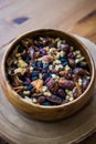 Dried Fruit Walnut, fig, palm, mulberry, date in a wooden bowl Royalty Free Stock Photo