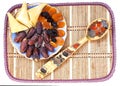 Dried fruits and colorful spoon