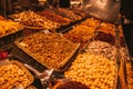 Dried fruit, nuts and sweets make for a colourful display at an indoor market in Barcelona, Spain. Royalty Free Stock Photo