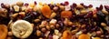 Dried fruits and nut mix on a white wooden surface, top view. Overhead, from above, flat lay Royalty Free Stock Photo