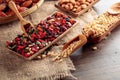 Dried fruits  various nuts  berries  and seeds on a wooden table Royalty Free Stock Photo