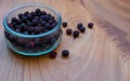 Dried fruits: wild rose, hawthorn in a glass jar on a wooden table-medicinal useful berries Royalty Free Stock Photo