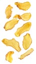 Dried ginger chips falling on transparent background Royalty Free Stock Photo