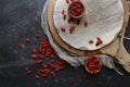 Dried Goji Berries on dark background, top view Royalty Free Stock Photo