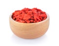 Dried goji berries in a small wooden bowl Royalty Free Stock Photo