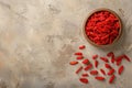 Dried goji berries in a wooden bowl Royalty Free Stock Photo