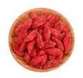 Dried goji berries in wooden bowl isolated on white background. Top view. Flat lay. Royalty Free Stock Photo