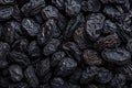 Dried grape delight Black raisin texture, a popular snack Royalty Free Stock Photo