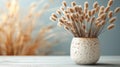 Dried grass bouquet in ceramic vase Royalty Free Stock Photo