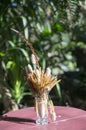 a dried grass flowers in vase on the table Royalty Free Stock Photo