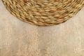 Dried Grass Straw Circular Woven Matt on Vintage Worn Background Royalty Free Stock Photo