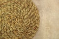 Dried Grass Straw Circular Woven Matt on Vintage Worn Background Royalty Free Stock Photo