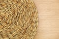 Dried Grass Straw Dried Grass Straw Circular Woven Matt on Wooden Background Woven Matt Royalty Free Stock Photo