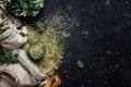 Dried ground oregano or marjoram, dark background, top view