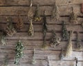 Dried herbs on very wooden background of ancient kitchen, pharmacy