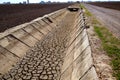 Dried irrigation ditch clay soil in Albufera fields Royalty Free Stock Photo