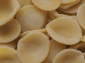 Dried italian orecchiette pasta food background Royalty Free Stock Photo