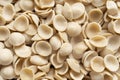 Dried italian orecchiette pasta food background Royalty Free Stock Photo