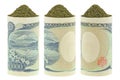 Dried Japanese green tea inside rolls of Japanese Yen banknotes