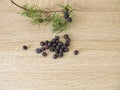 Dried juniper berries and juniper twig Royalty Free Stock Photo