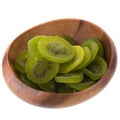 Dried kiwi fruit In wooden bowl, dried preserved candied kiwifruit slices sugary sweet snack isolated on white background Royalty Free Stock Photo