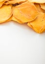 Dried large sweet mango slices on white background.Macro Royalty Free Stock Photo